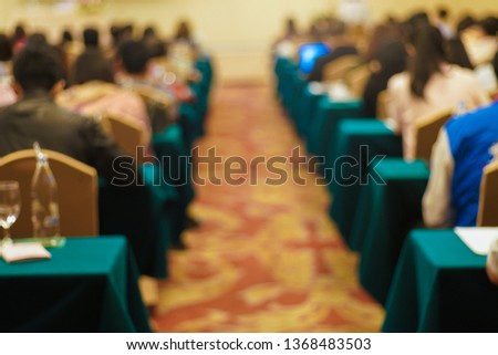 Blurred group of business people learnning in seminar room education background