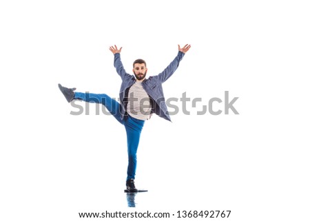 Male dancer is doing modern dance isolated on white background