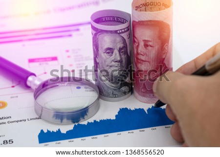 US dollar and Yuan China which its are 2 biggest countries for economic growth.Now America and China announce tariff tax policy to make conflict. Royalty-Free Stock Photo #1368556520