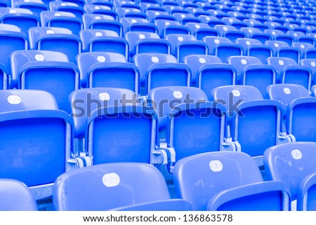 Blue chairs in the stadium