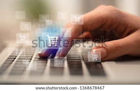 Business woman hand typing on keyboard with online shopping concept Royalty-Free Stock Photo #1368678467