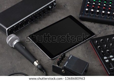 Empty tablet and electronic music instruments 