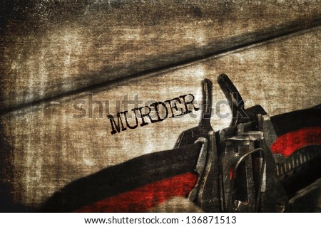 word murder written with an old typewriter Royalty-Free Stock Photo #136871513