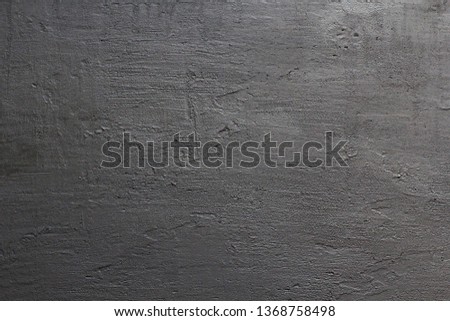 Clean chalk board surface. Black board with a metallic sheen. Metallic background. Empty Black Background for Design. Black Background from Plaster, For Design, Decoration and Templates. Copy space.
