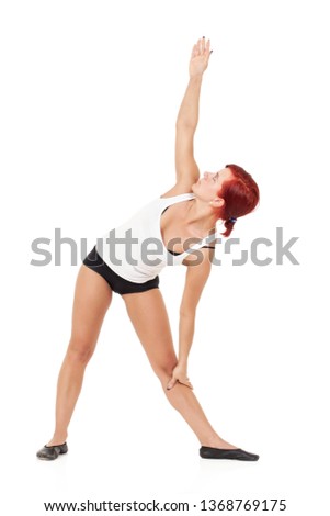 Pretty sporty woman in doing yoga on white background