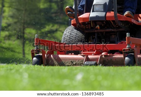 Ride-on lawnmower Royalty-Free Stock Photo #136893485