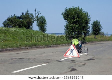 Equipment for road marking with the sign of road repair