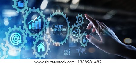 Asset management Business technology internet concept button on virtual screen. Royalty-Free Stock Photo #1368981482