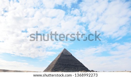 The great pyramid of Giza with beautiful sky with clouds