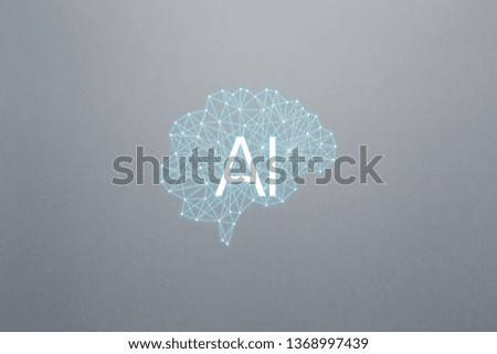 Concept AI(Artificial Intelligence). Neural networks, machine and deep learning, and another modern technologies concepts. Brain representing artificial intelligence. Concept on gray background
