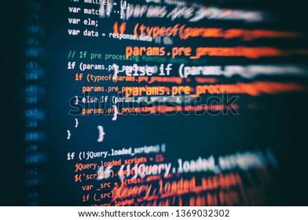 Website HTML Code on the Laptop Display Closeup Photo. Desktop PC monitor photo.