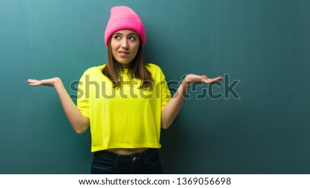 Young modern woman confused and doubtful