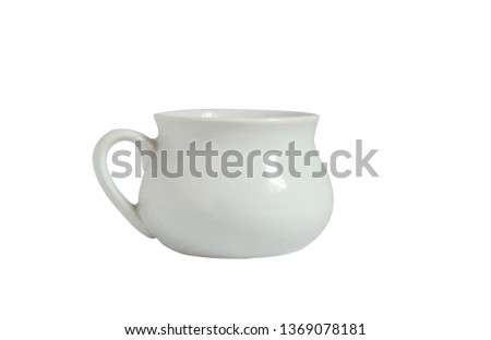 White ceramic jug with handle on white background. Isolated object. Kitchen utensils.
