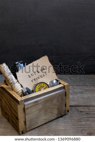 Travel and vacation, wooden box table background, compass, map