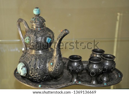 imperial kettle kumgang. ritual silver vases. Kumgang for holy water. Silver teapot with natural stones kolara, turquoise