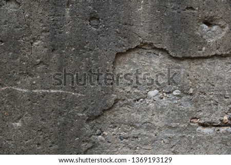 Gray Concrete background with partly breakaway layer.