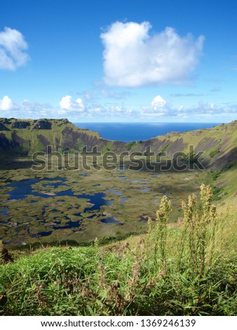 View of the Rano Kau Volcano Crater and its inner lagoon, overlooking the South Pacific Ocean in Easter Island, Chile.