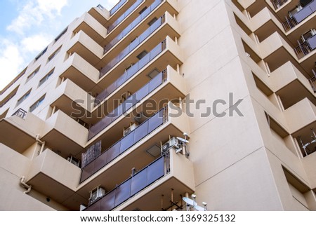 Housing apartments in the center of the city of Japan.architecture, background, modern, city, white, black, architectural, structure,  contemporary, landscape, horizontal. Royalty-Free Stock Photo #1369325132