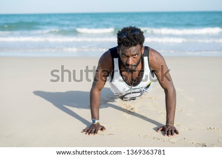 rasta black man enjoy in the beach