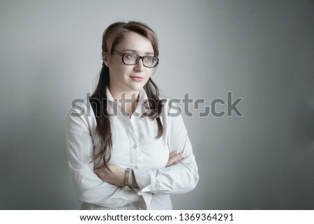 portrait of an Executive business woman on a gray background