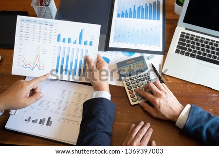 Financial accountant , planner , meeting , business cousultation , introduction Royalty-Free Stock Photo #1369397003