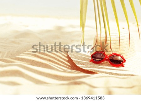 summer beach relax background with sunglasses and hat
