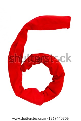 Number six (6) different colored clothes on a white background. Isolated