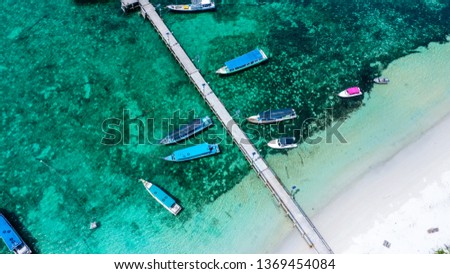 aerial view boat dock on Tanjung Kelayang Royalty-Free Stock Photo #1369454084