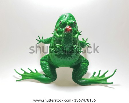 toy frog on white background