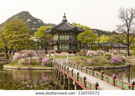 The Pavilion of Far-Reaching Fragrance is a small pagoda on an artificial island in the center of a small lake in the Gyeongbokgung Palace complex in Seoul. Royalty-Free Stock Photo #136950572