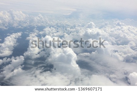Aerial view, Blue sky and Clouds Cumulonimbus a large group of white filled the sky beautiful at Thailand