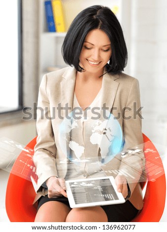 picture of happy woman with tablet pc showing virtual screen