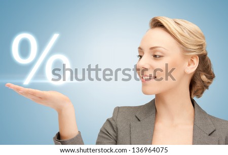 picture of woman showing sign of percent in her hand