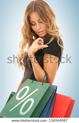 picture of beautiful woman with shopping bags