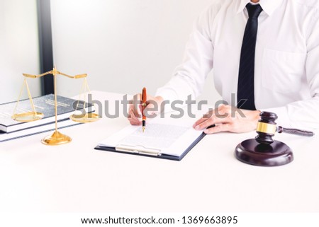 gavel and sound block of justice law and lawyer working on wooden desk background