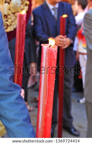 Red candles in the Procession of Corpus Christi at the neighborhood of Triana (Corpus Chico), one of the most unique religious celebrations in Seville.
