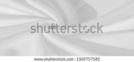 Texture, background, pattern, silk fabric of white color, solid light white silk satin fabric of the duchess Really beautiful silk fabric with satin sheen. Perfect for your design, wedding invitations
