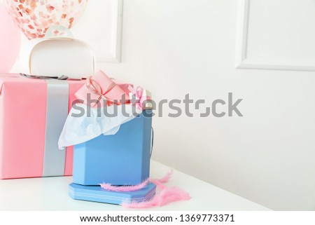Beautiful gifts on white table