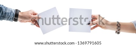 Hands holding, delivering blank piece of paper