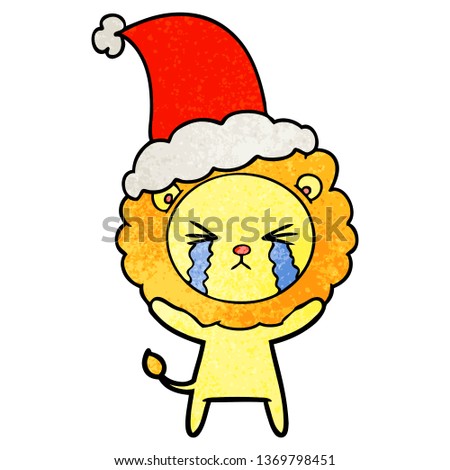 hand drawn textured cartoon of a crying lion wearing santa hat