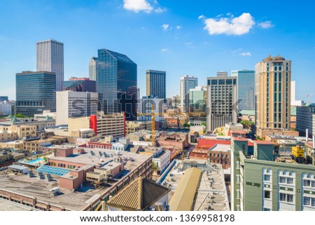 New Orleans, Louisiana, USA downtown rooftop city skyline in the afternoon.