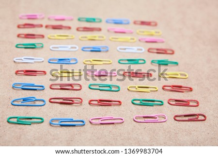 Paperclips in row. Concept of order in office