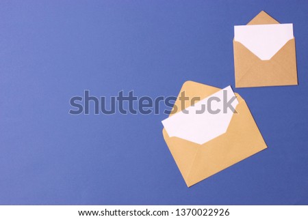 
envelope on a colored background top view.