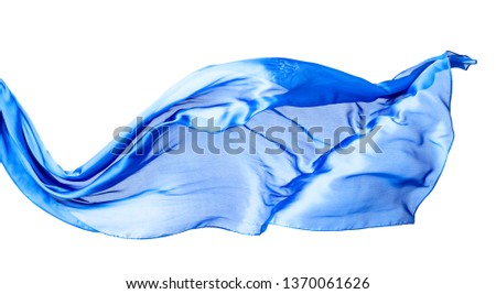 Smooth elegant blue transparent cloth isolated on white background. Texture of flying fabric.