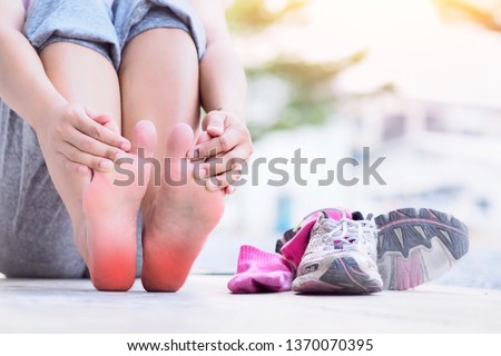 Heel pain and foot (plantar fasciitis).
Caused by exercise or running. Royalty-Free Stock Photo #1370070395