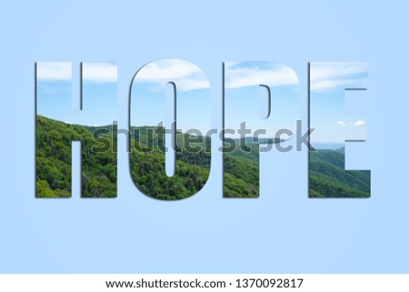 Text "Hope" made from mountains and sky picture. Natural background.