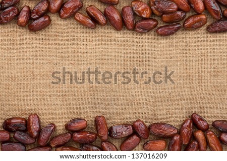 Date lying on sackcloth with space for text Royalty-Free Stock Photo #137016209