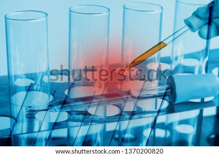 science laboratory test tubes , laboratory equipment
