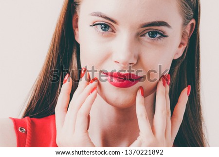 Woman red lips and dress beauty closeup face healthy skin and hair
