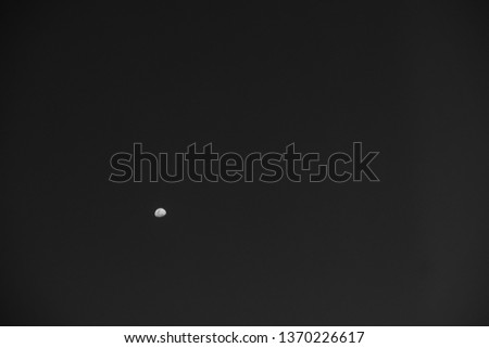Small moon In the night without stars in the sky